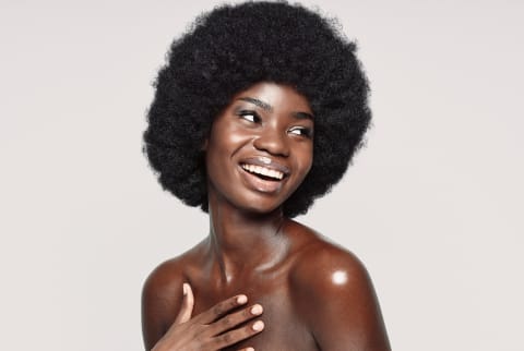 black woman with glowing skin