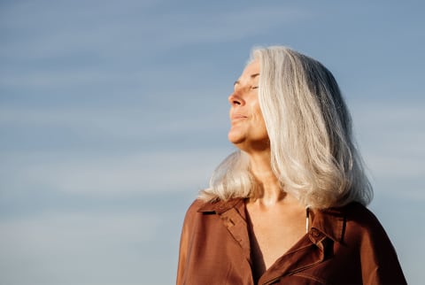 older woman basking in the sun