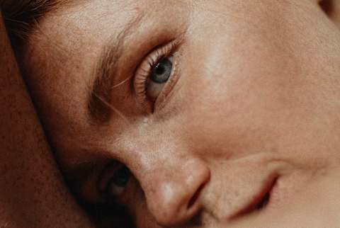 close up of woman with blue eyes close up of woman with blue eyes