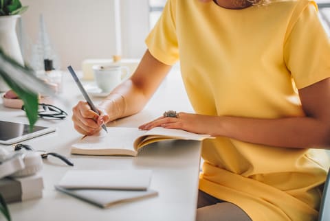 Busy Unrecognizable Woman Working At Her Desk