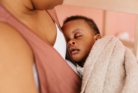 Mother Holding Her Infant Son in Her Arms