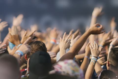 Crowd cheering at a live concert