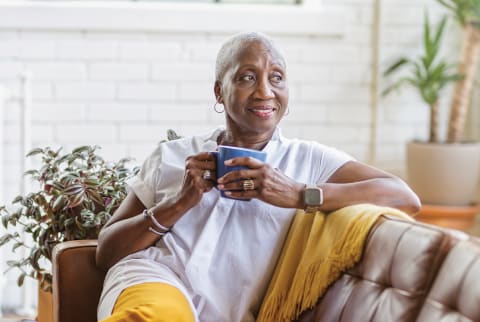 older woman drinking coffee