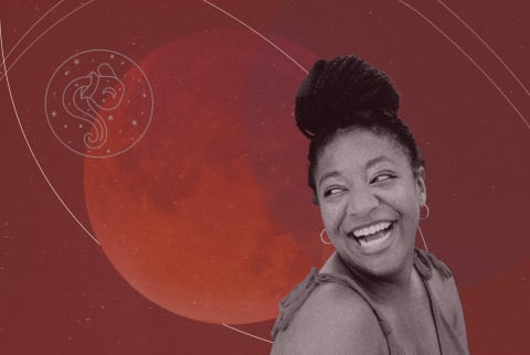 woman smiling with full moon in aquarius background