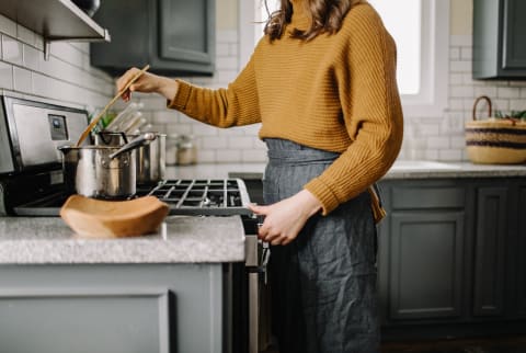 Woman in cooking in her kitchen