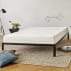 Latex mattress on bed frame
