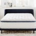 white mattress with dark blue trim