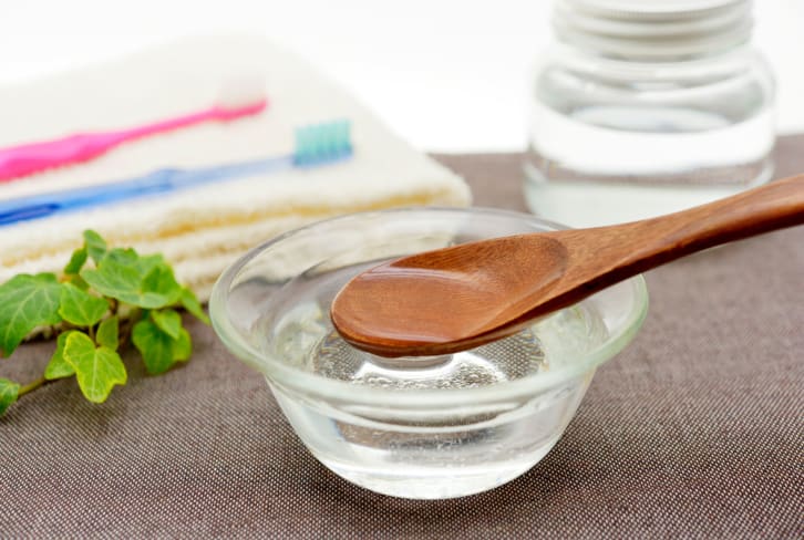 Let's Settle This: Does Oil Pulling Actually Work? Dentists Tell All