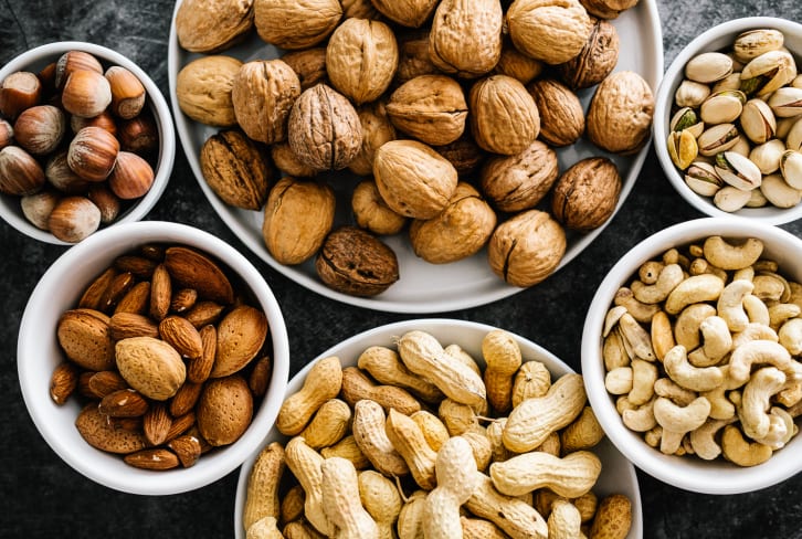 9 Healthy Nuts To Eat For Balanced Hormones, Smooth Skin, & More