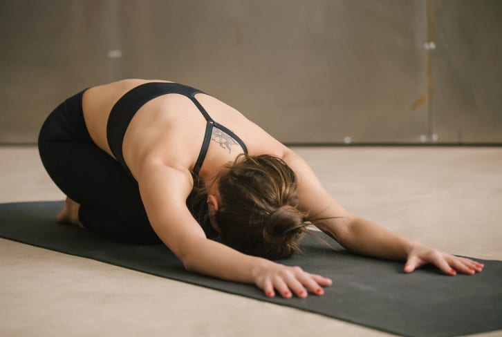 Kick PMS Symptoms To The Curb With This Juicy Yoga Sequence