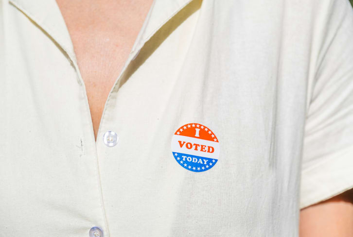 Long Voting Lines? Try These 7 Expert-Backed Tips For Your Body & Mind
