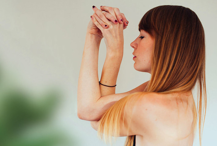 These Yoga Moves For Back & Shoulder Stiffness Are Better Than A Massage