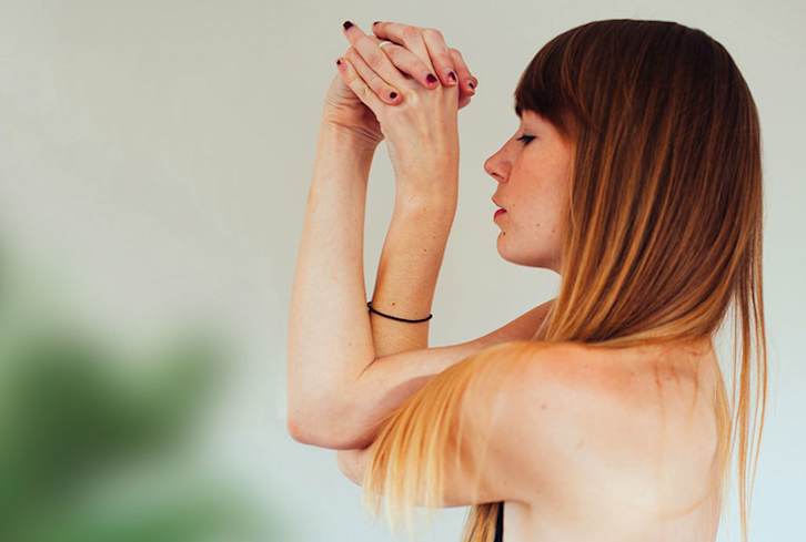 These Yoga Moves For Back & Shoulder Stiffness Are Better Than A Massage