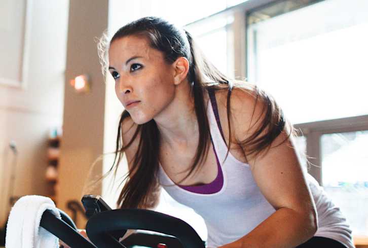 Let's Settle This: Is Spinning Actually A Good Workout?