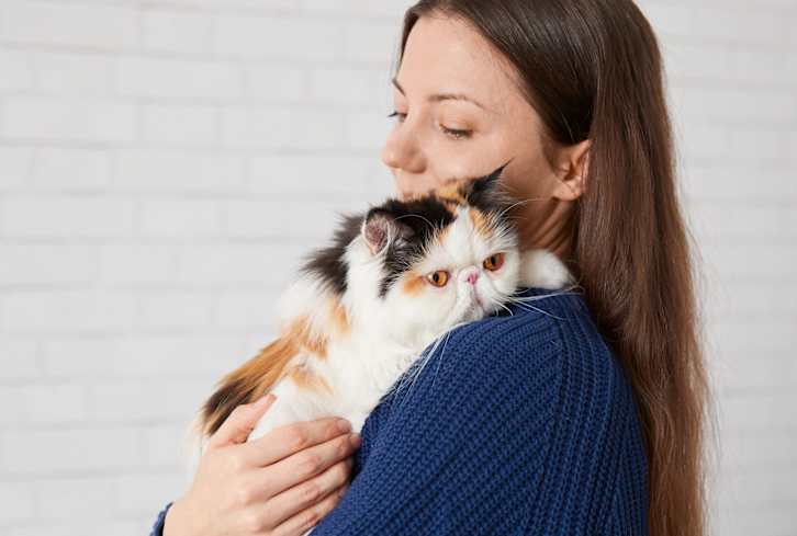 I’m A Yogi But Honestly Learned 5 Major Self-Care Lessons From My Cat