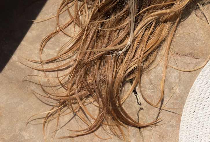 Should You Be Rinsing Your Hair With Apple Cider Vinegar? (Probably!)