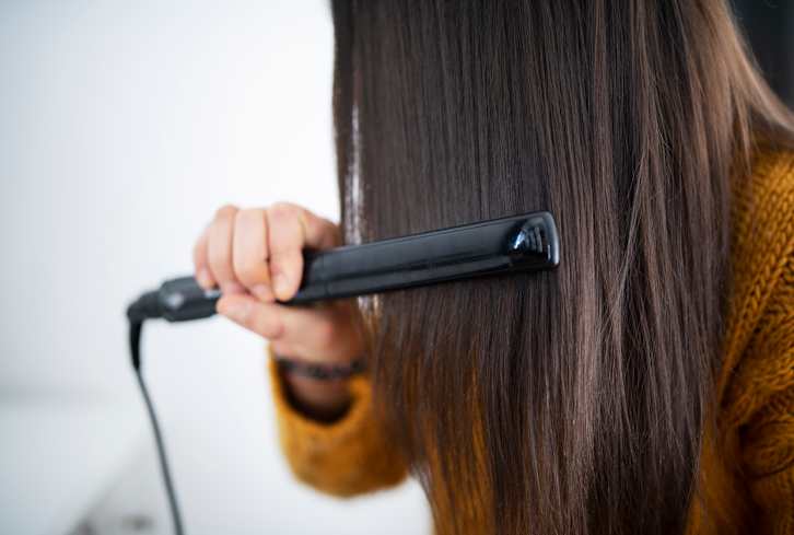 We Asked The Pros: Here's Exactly How To Fix Heat-Damaged Hair