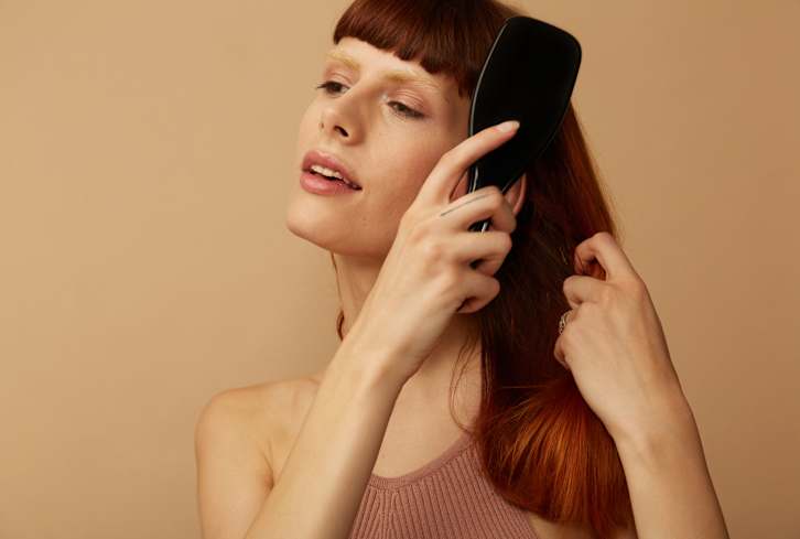 The Best Time To Shower To Avoid Hair Damage & Breakage
