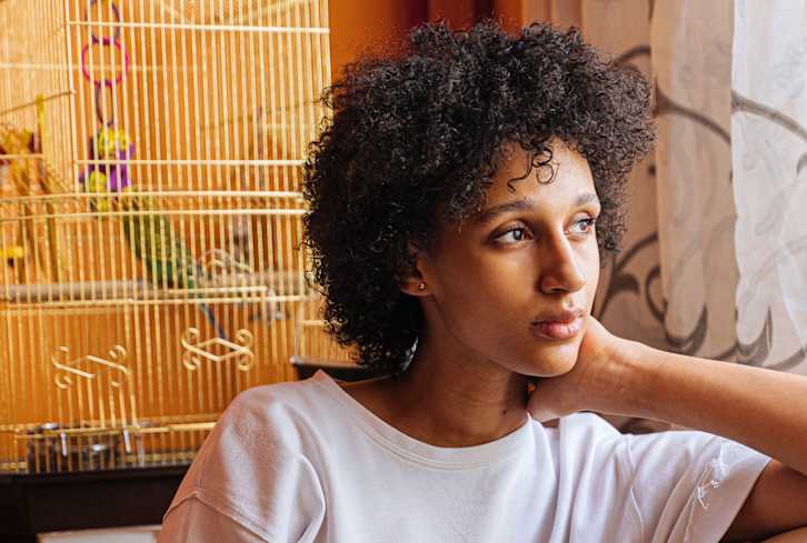 The Full Guide To Caring For Coily + Curly Hair (It Covers Everything!)