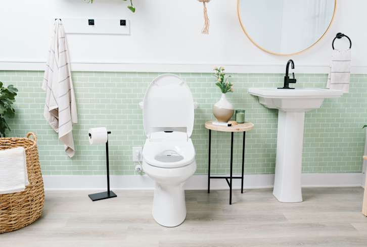 The Surprising Reason You Might Not Want To Squat Over Public Toilets