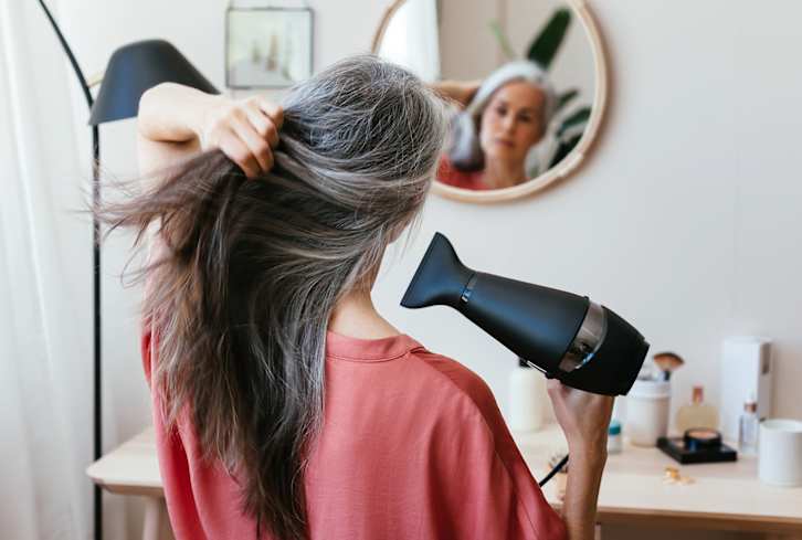 This Is A Top Colorist's No. 1 Tip To Keep Gray Hair Shiny & Bright
