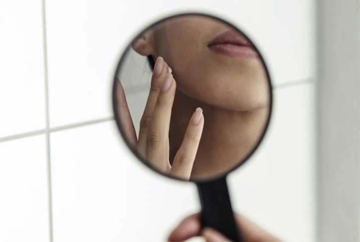 Once & For All: Does Biotin Cause Breakouts? Derms Explain
