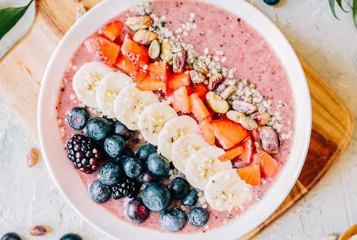 The Sneaky Reason Fruit Can Upset Your Stomach (& How To Avoid It)