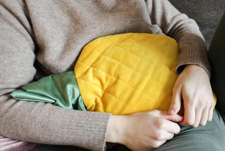 How To Use A Tube Sock As A DIY Period Cramp Soother (No Joke)