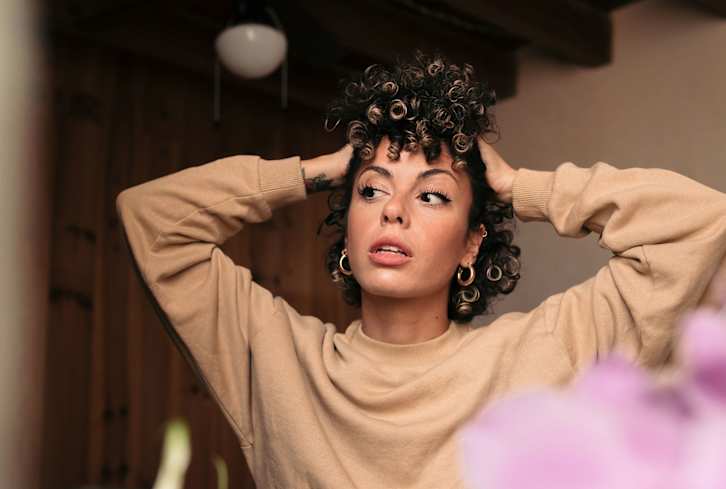 Is This Styling Hack The Key To Frizz-Free Hair? Experts Weigh In