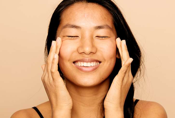 I'm A Holistic Derm & This Is My Go-To Practice For Glowing Skin