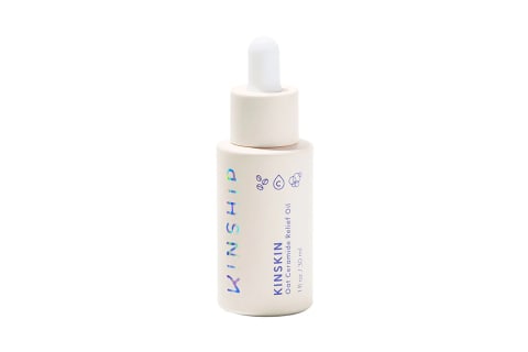 white dropper bottle of face serum