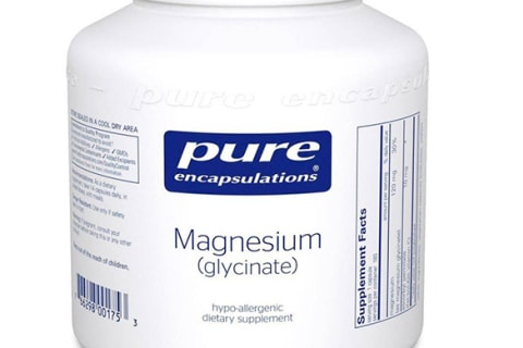 White supplement bottle with blue label for magnesium