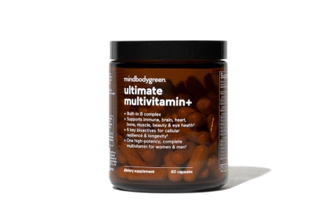 Ultimate multivitamin+ in an amber glass bottle against white background