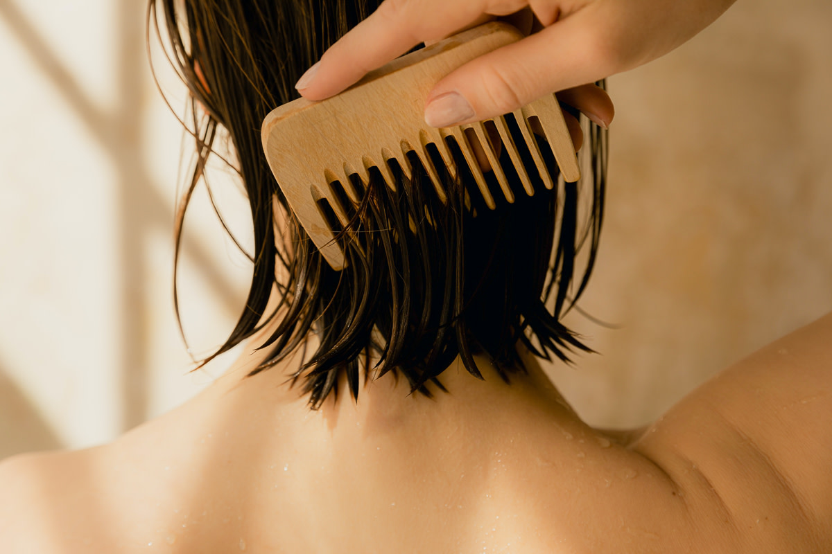 5 Signs You Are Shedding Too Much Hair From Top Hairstylists | mindbodygreen