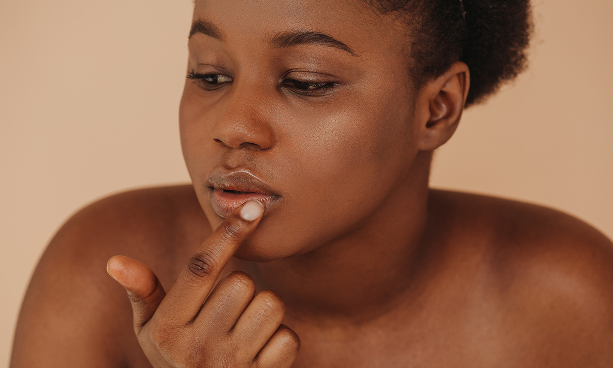 The Lip Balm These Holistic Derms & MDs Swear By & Why