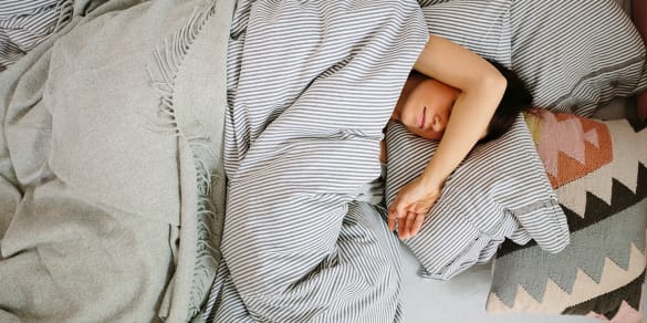Image of Your Heart Wants More Sleep — Here's Why (& How To Get It)