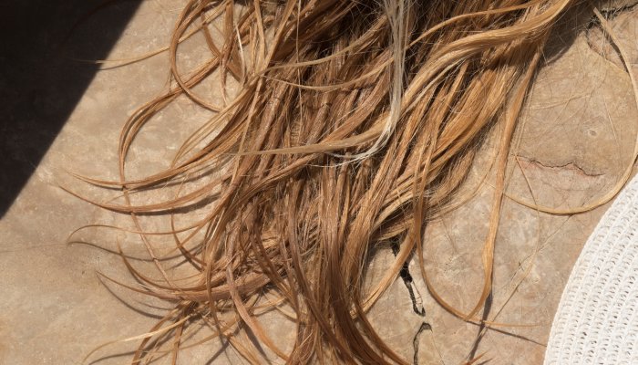 Chlorine and Saltwater Can Damage Your Hair — Here's How To Prevent That 1