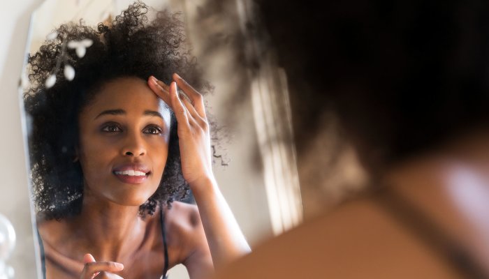 6 Things Stress & Poor Sleep Can Do To Your Skin, From A Top Derm