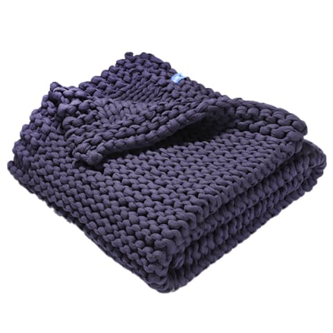 Navy blue, knitted weighted blanket, folded up. 