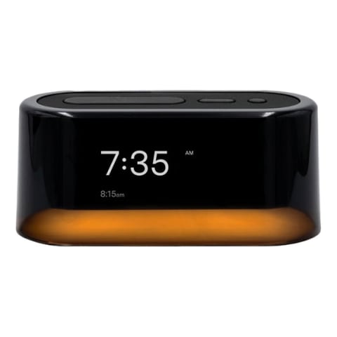 black alarm clock with orange bottom