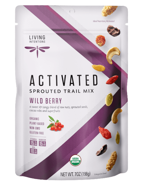 Trail mix packaging with a purple V going through the front, mix of different nuts and dried fruits pictured on the front.