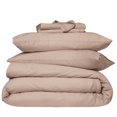 rust colored duvet and pillow stacked