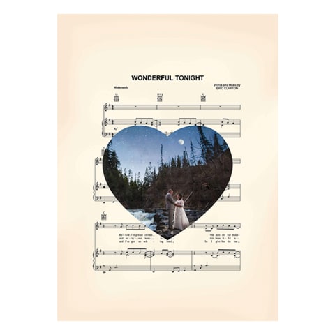 sheet music with photo of couple over it