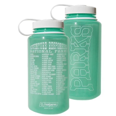 plastic water bottle in light green with white writing and lid