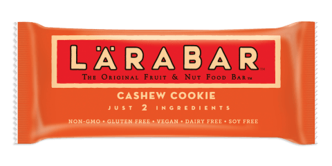Orange fruit and nut bar packaging with words Larabar written on the front, cashew cookie flavored.