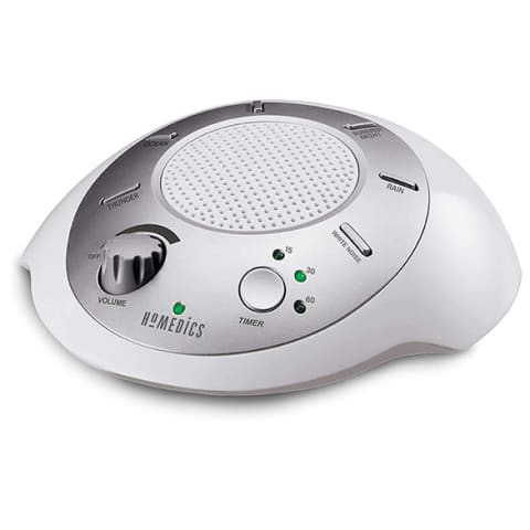 round sound machine in white with speaker