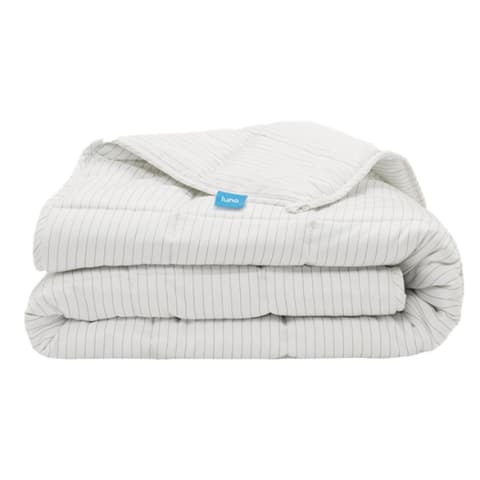 White bamboo weighted blanket with thin grey stripes, folded. 