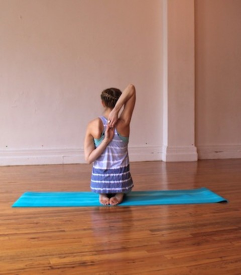 cow face arms yoga pose