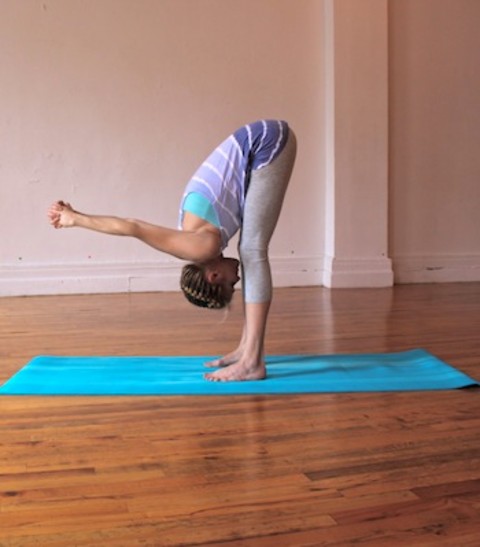 standing forward fold yoga pose