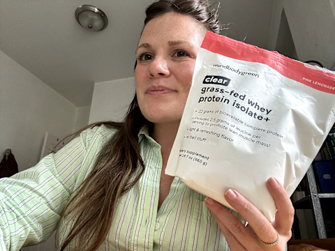 author holding bag of mindbodygreen clear protein author holding bag of mindbodygreen clear protein